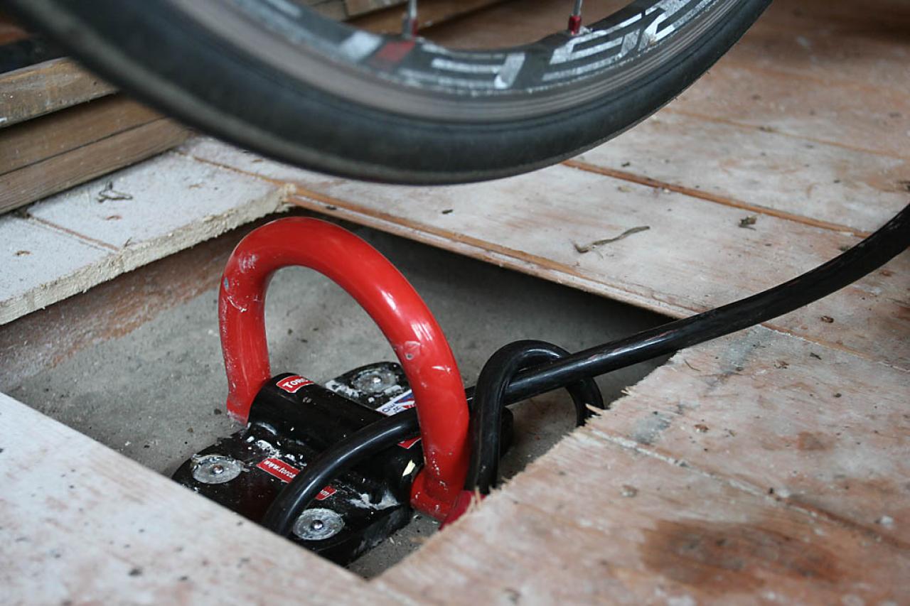 Bicycle store ground anchor